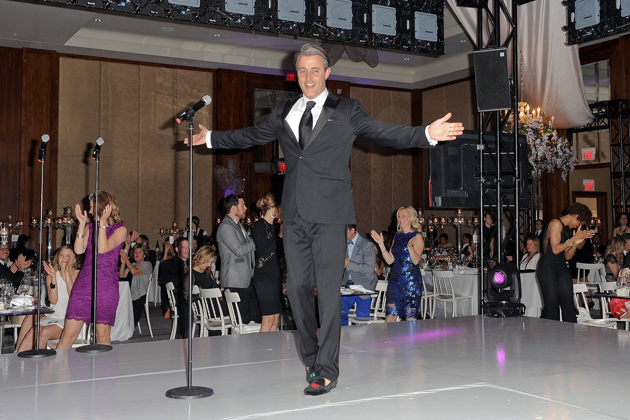 Ben Mulroney addressing guests at a Toronto media event.