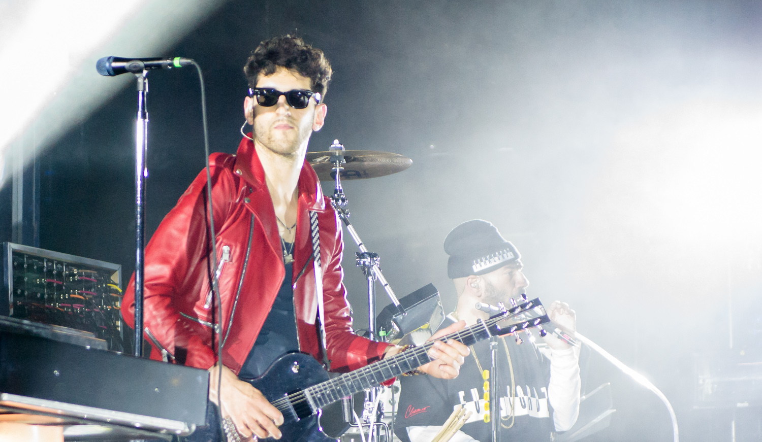 Chromeo performing on a brightly lit Toronto stage.