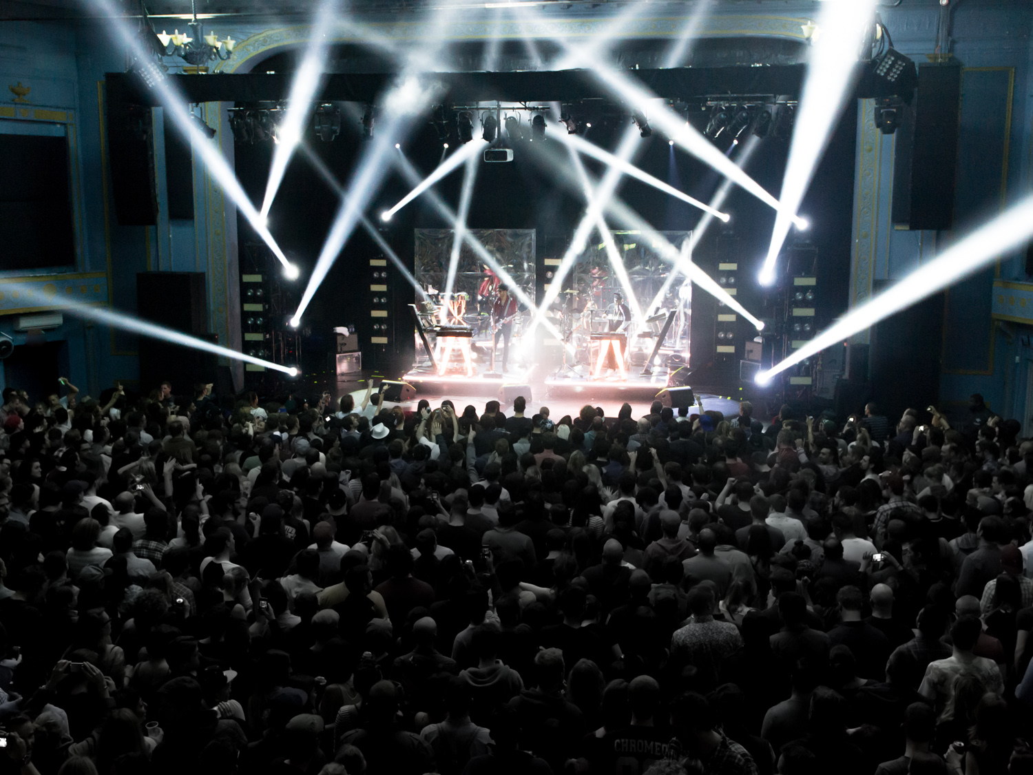 Wide view of Chromeo performing before a packed Toronto audience.