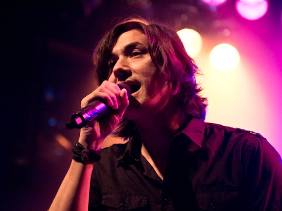 David Usher singing during a live Toronto concert.