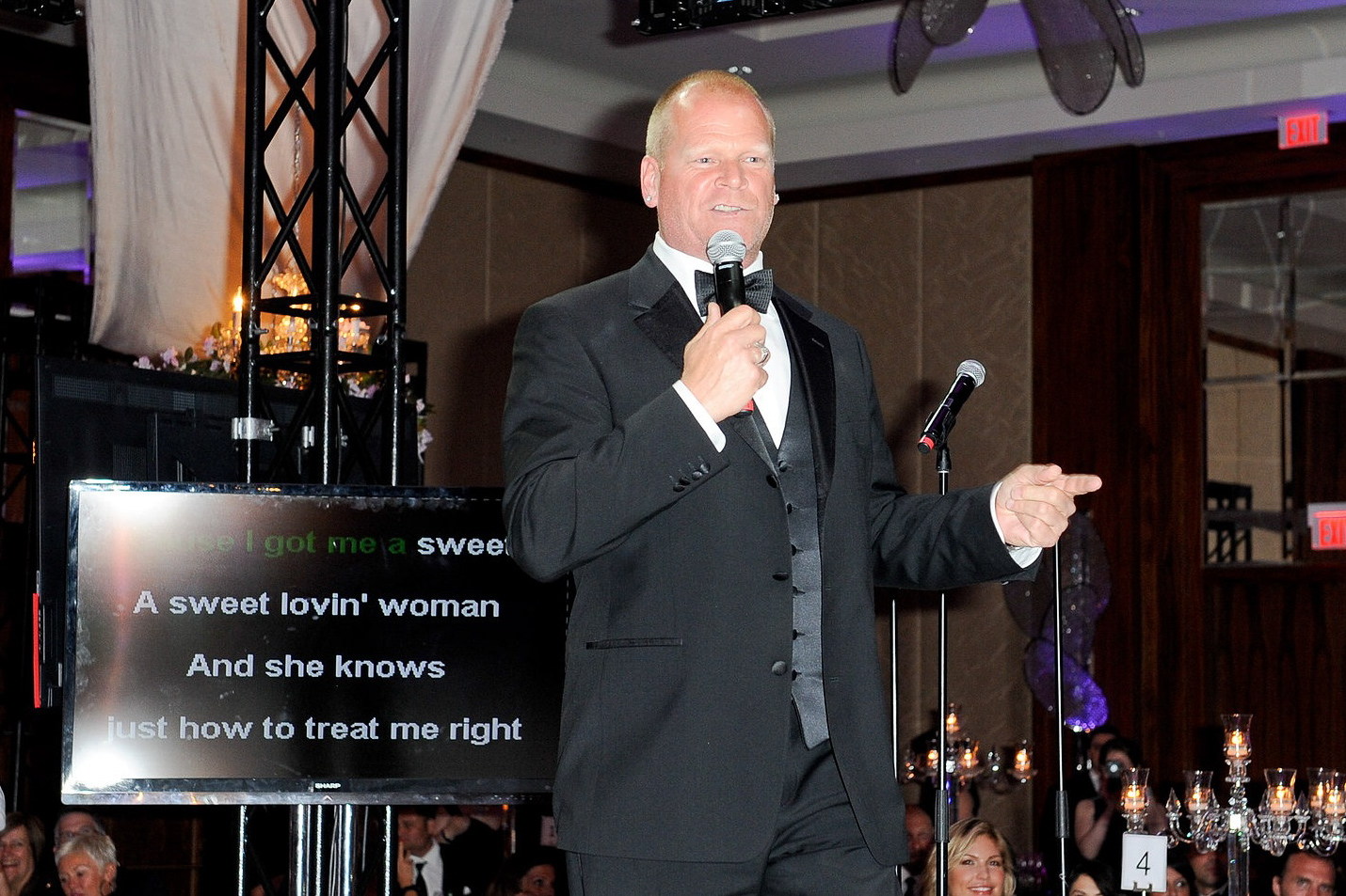 Mike Holmes speaking at a Toronto media event.