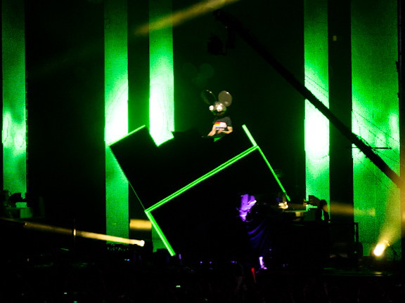 Wide view of a DJ performing on the geometric VELD Music Festival stage.